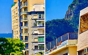 Quarto e sala vista Cristo e mar de Copacabana